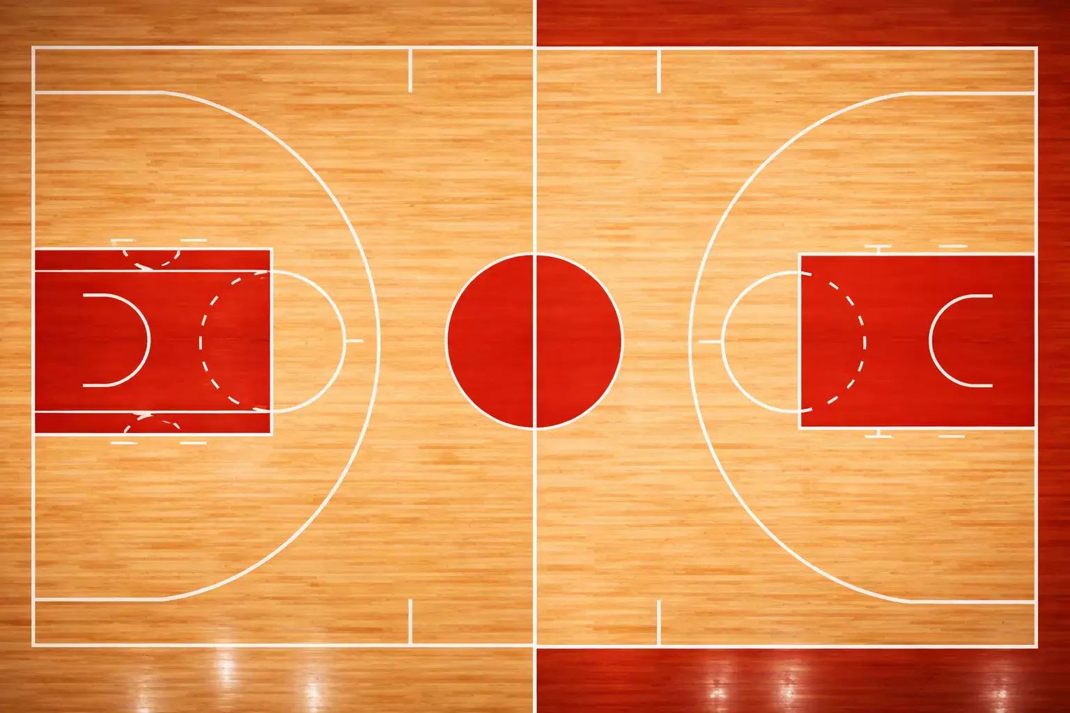 Dos canastas de baloncesto enfrentadas en una cancha profesional con líneas de triple marcadas